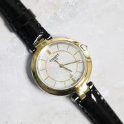 Tissot Flamingo Mother of Pearl White Dial Black Leather Strap Watch For Women - T094.210.26.111.00