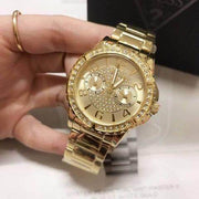 Guess Sassy Analog Quartz Gold Dial Gold Steel Strap Watch For Women - W0705L2