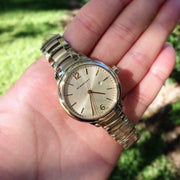 Burberry The Classic Champagne Gold Dial Gold Steel Strap Watch for Women - BU10109
