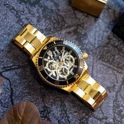 Guess Axle Multifunction Black Dial Gold Steel Strap Watch For Men - GW0488G2