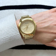 Guess Cubed Analog Gold Dial Gold Steel Strap Watch For Women - GW0606L2