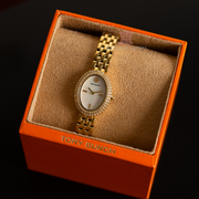 Tory Burch Oval Mother of Pearl Dial Gold Steel Strap Watch for Women - TBW6034