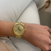 Tissot PR 100 Gold Dial Gold Steel Strap Watch for Women - T150.210.33.021.00