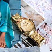 Guess Cubed Analog Gold Dial Gold Steel Strap Watch For Women - GW0606L2