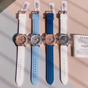 Guess Confetti Crystal Silver Dial Blue Rubber Strap Watch For Women - W1098L3